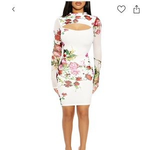 Naked Wardrobe's mini dress features a bright floral print and cut-out detail